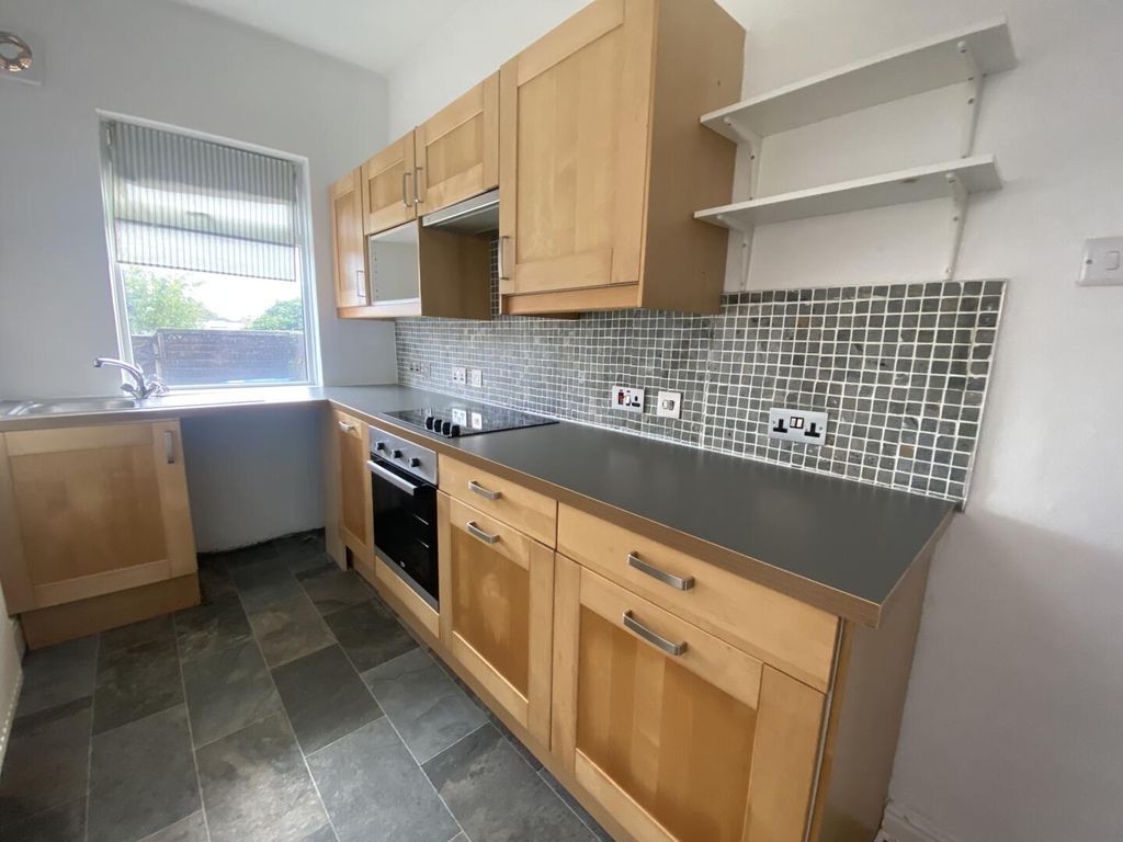 Property photo 2 of 8 Kitchen