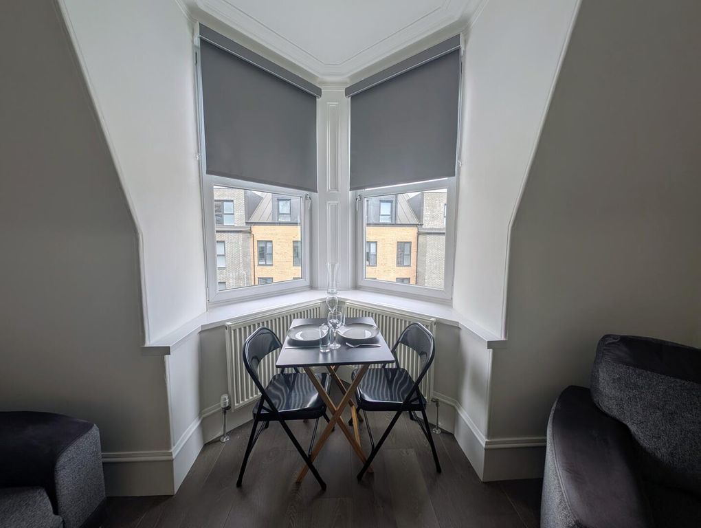 Property photo 3 of 11 Dining Room