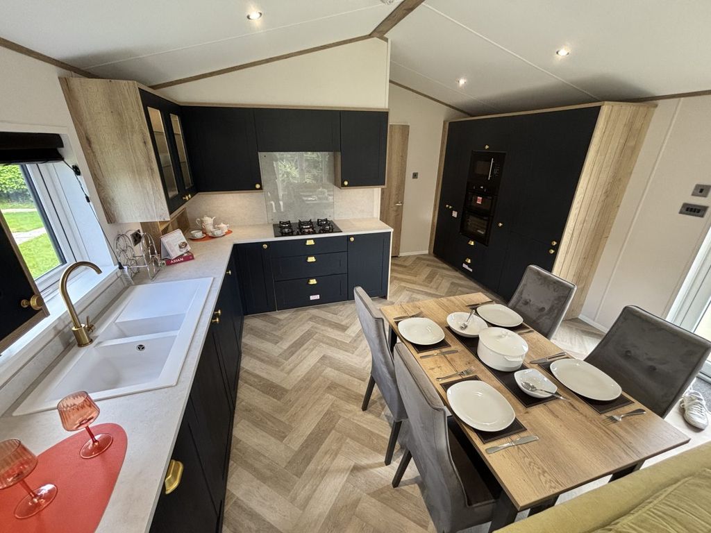 Property photo 3 of 10 Spacious Kitchen Diner With Integrated Appliances And Herringbone Style Flooring