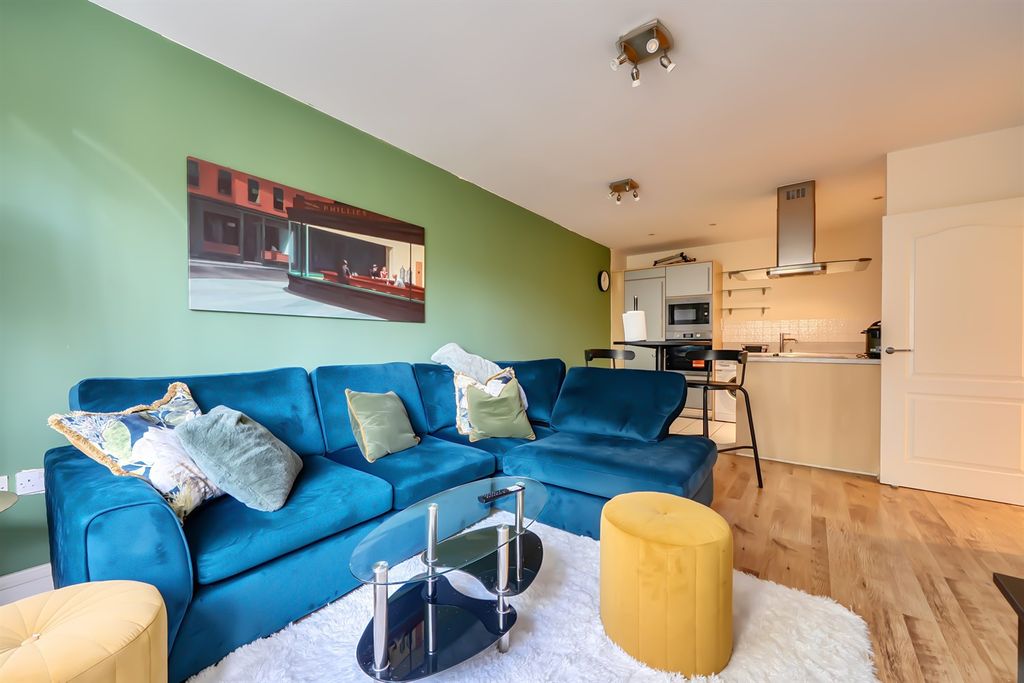 Property photo 3 of 13 Living Area