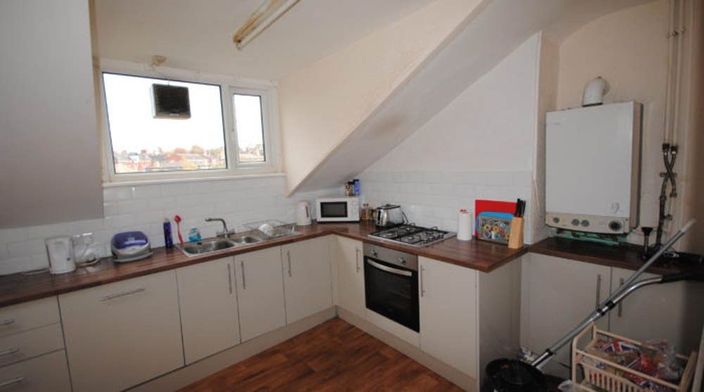 Property photo 3 of 4 Bright And Functional Kitchen Area With Ample Coun...