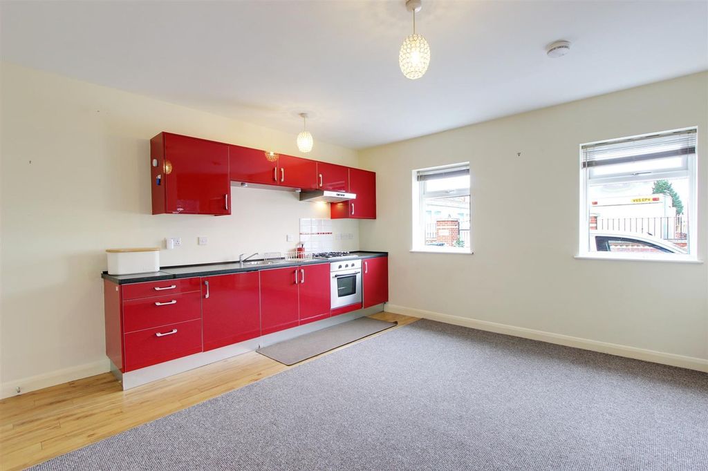 Property photo 2 of 6 Kitchen Area