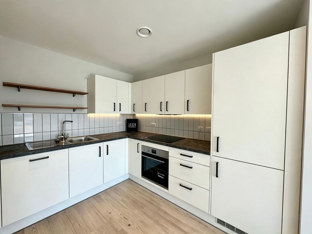 Property photo 2 of 8 203 - Kitchen