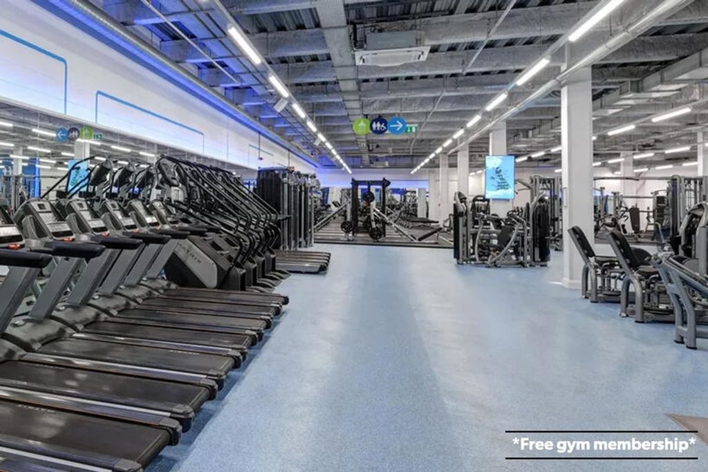Property photo 2 of 7 A Modern Gym Facility Featuring A Spacious Layout ...