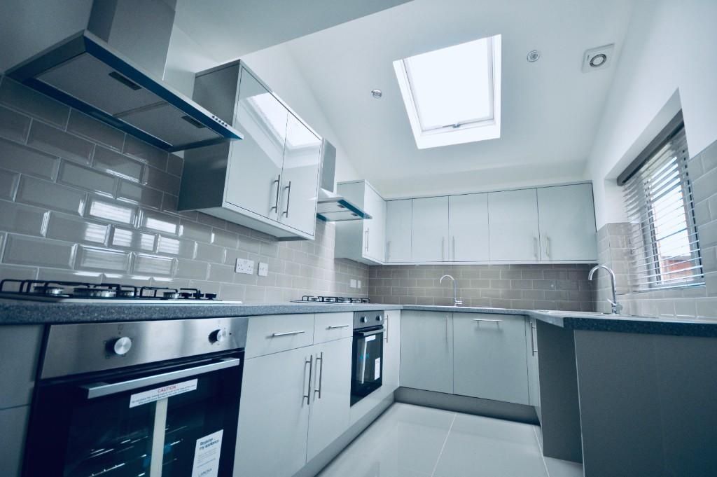 Property photo 2 of 9 This Spacious Kitchen Features Modern Appliances A...