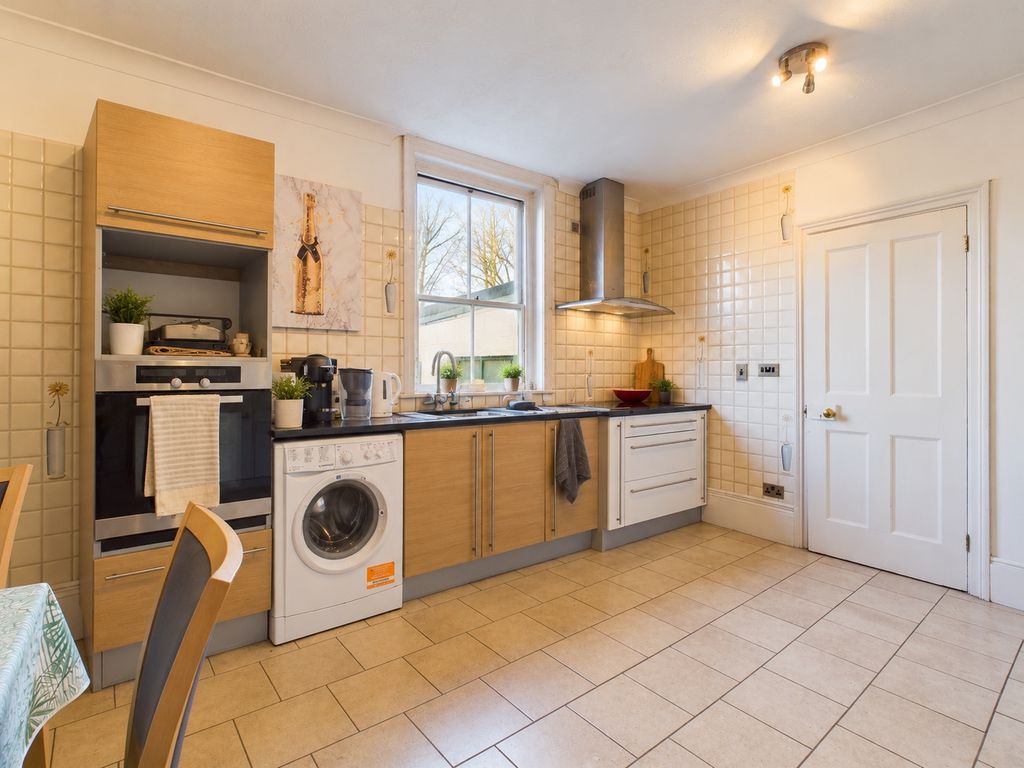 Property photo 3 of 4 Warm Modern Kitchen With Garden Views