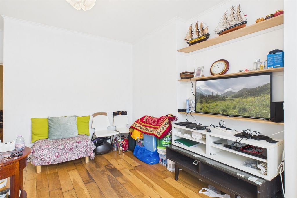 Property photo 2 of 12 Living Area