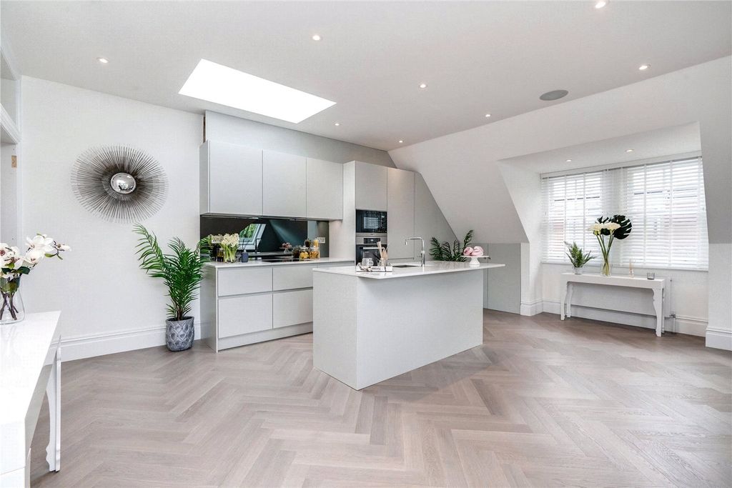 Property photo 1 of 12 Kitchen/Living Area