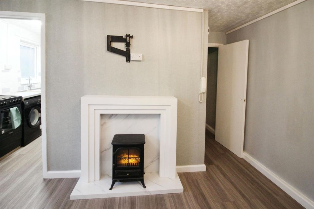 Property photo 3 of 10 Living Area