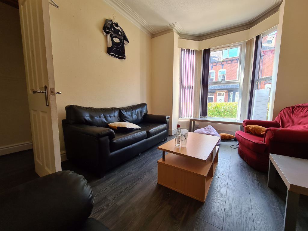 Property photo 1 of 14 A Welcoming And Well-Maintained Living Room With A...