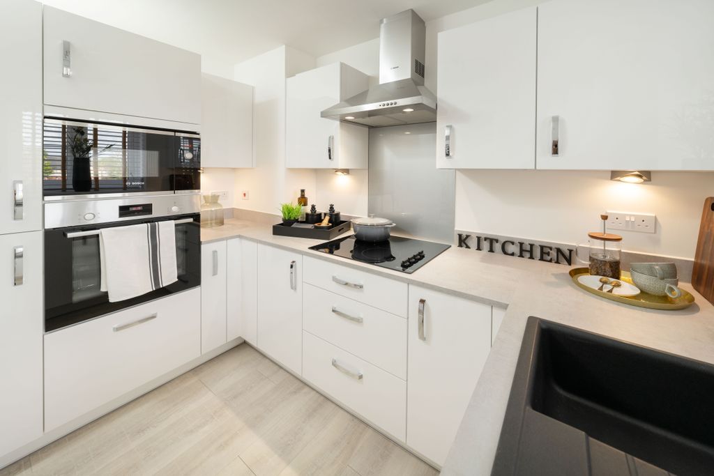 Property photo 2 of 10 Typical Kitchen