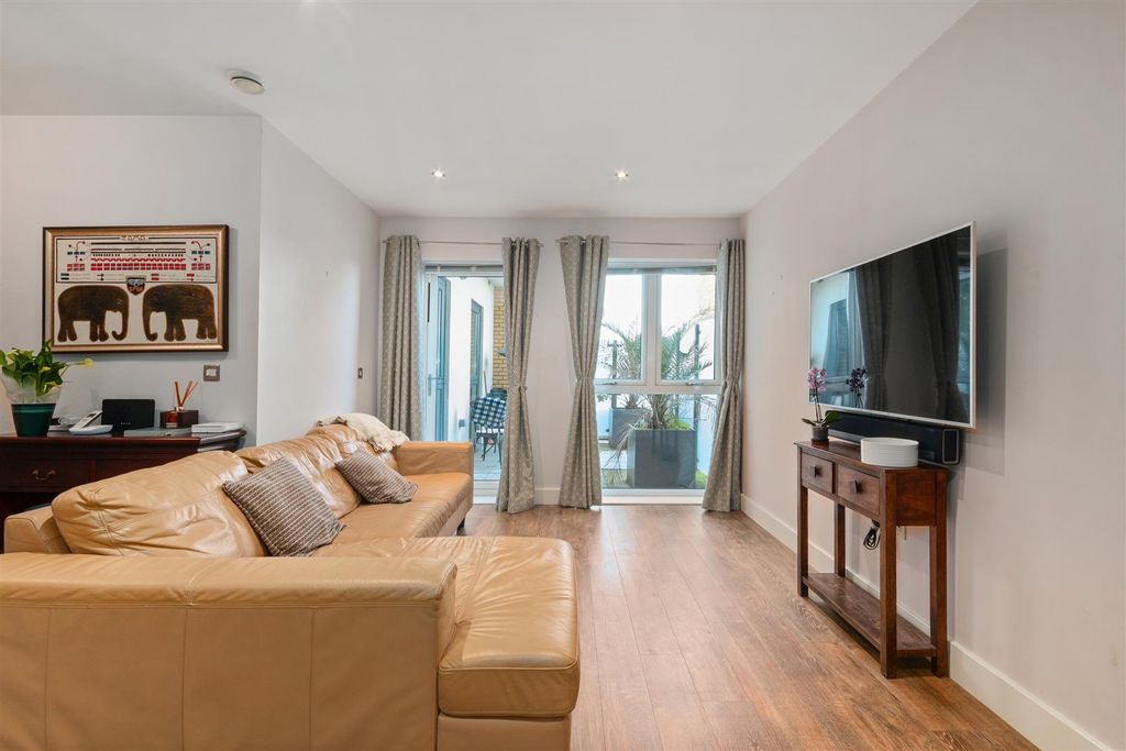 Property photo 3 of 12 Living Area