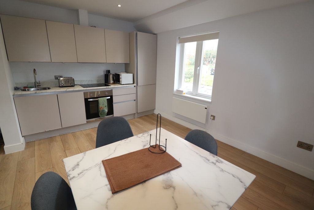 Property photo 2 of 8 Kitchen