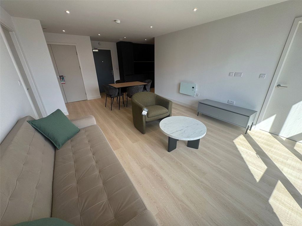 Property photo 3 of 18 Living Area