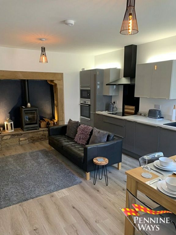 Property photo 2 of 10 Living Area