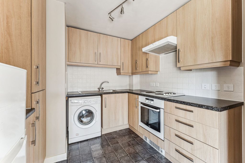 Property photo 2 of 9 Kitchen