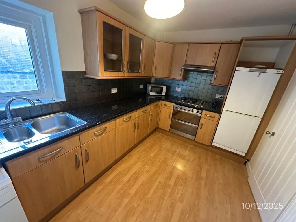 Property photo 2 of 11 Dining Kitchen