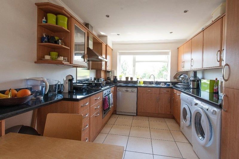 Property photo 2 of 9 Spacious Kitchen With Modern Appliances And Light...