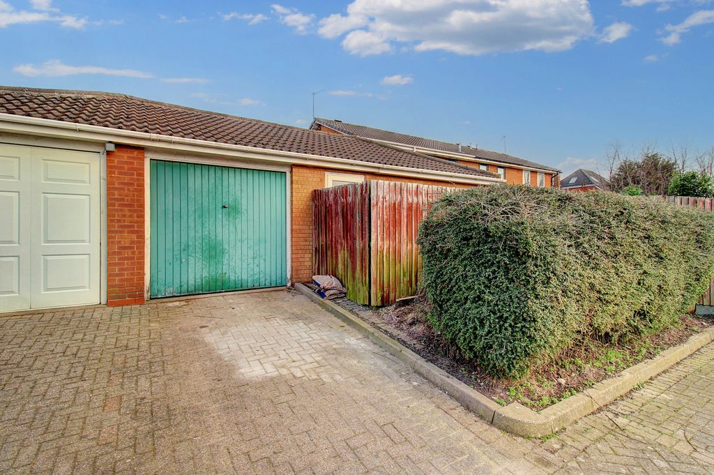 Property photo 2 of 13 Garage