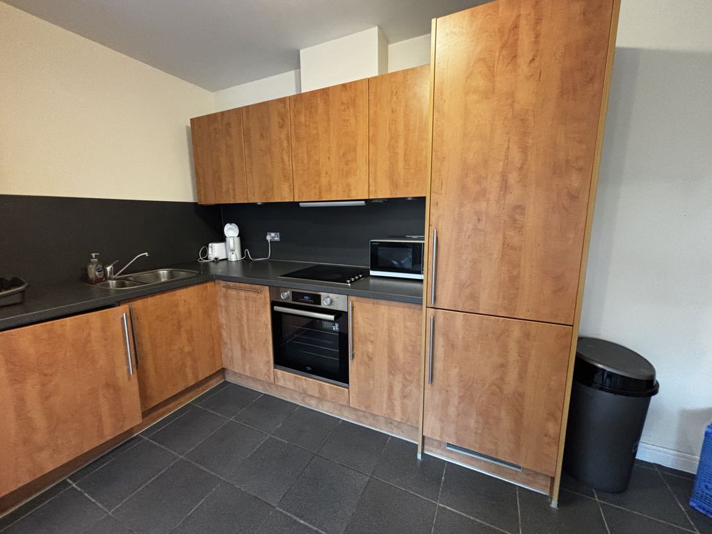 Property photo 3 of 8 Kitchen