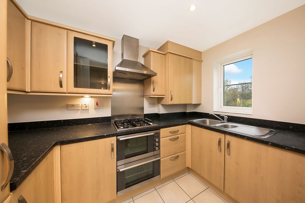 Property photo 2 of 12 Kitchen