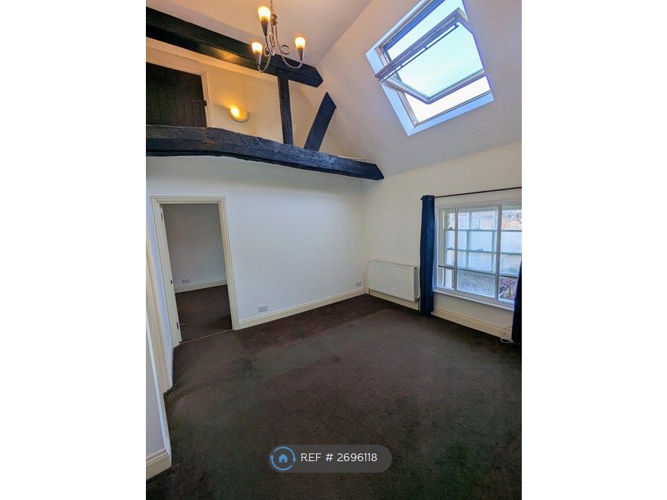 Property photo 3 of 19 Living Room With Skylight