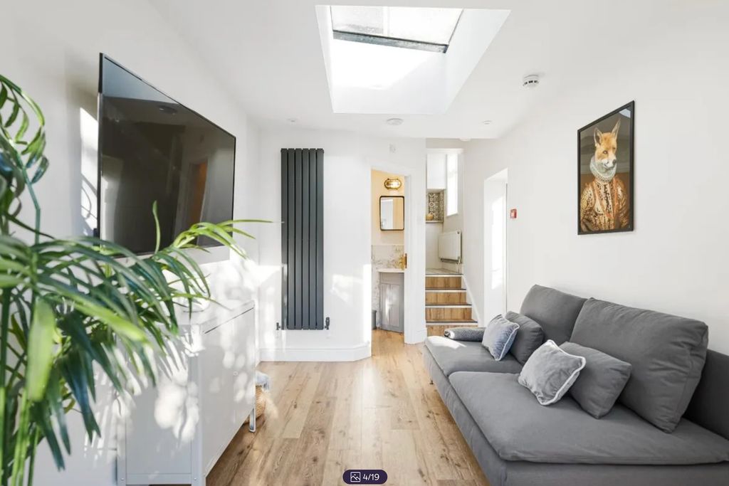Property photo 3 of 19 A Bright And Spacious Modern Living Room Featuring...