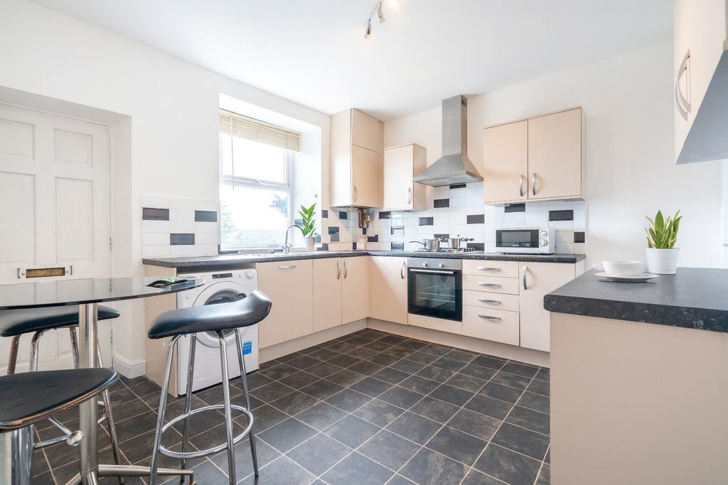 Property photo 2 of 6 Bright And Modern Kitchen With Ample Natural Light...