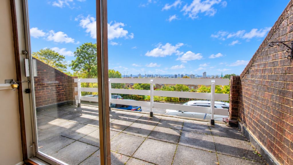 Property photo 3 of 26 Sunny Balcony View With City Skyline