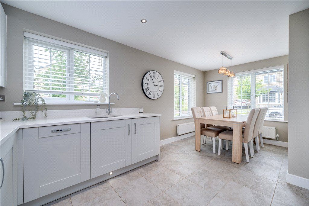 Property photo 3 of 16 Dining Kitchen