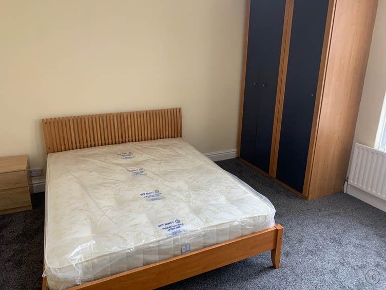 Property photo 1 of 14 A Spacious Master Bedroom With Modern Furnishings,...