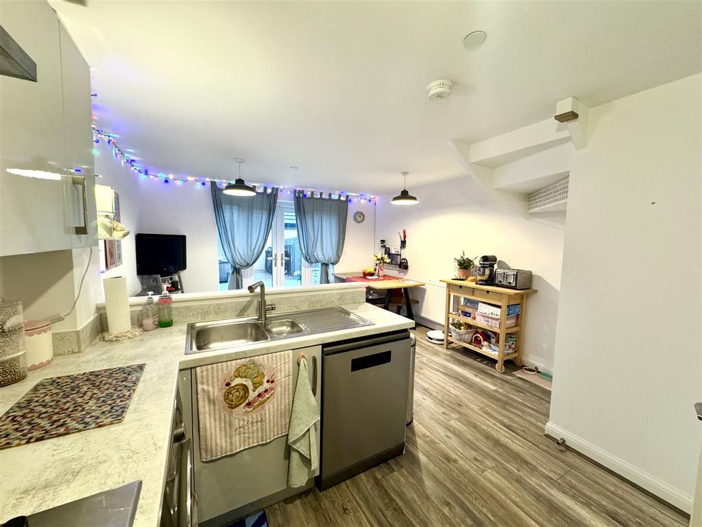 Property photo 2 of 17 Kitchen/Dining/Family Room