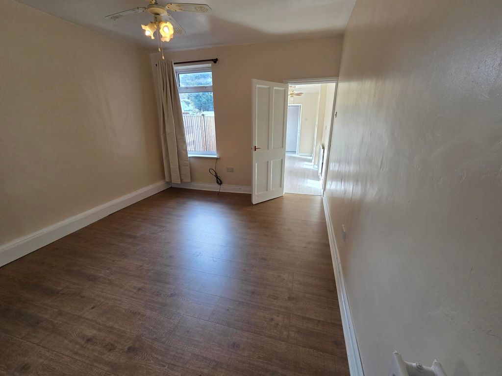 Property photo 3 of 9 Front