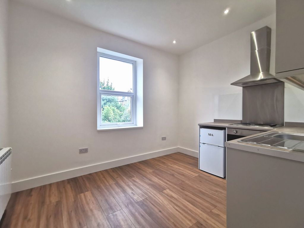 Property photo 3 of 9 Living Area