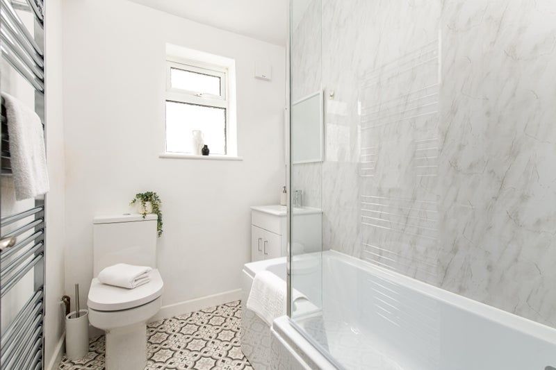 Property photo 2 of 14 Bright, Modern Bathroom With A Bathtub And Shower,...