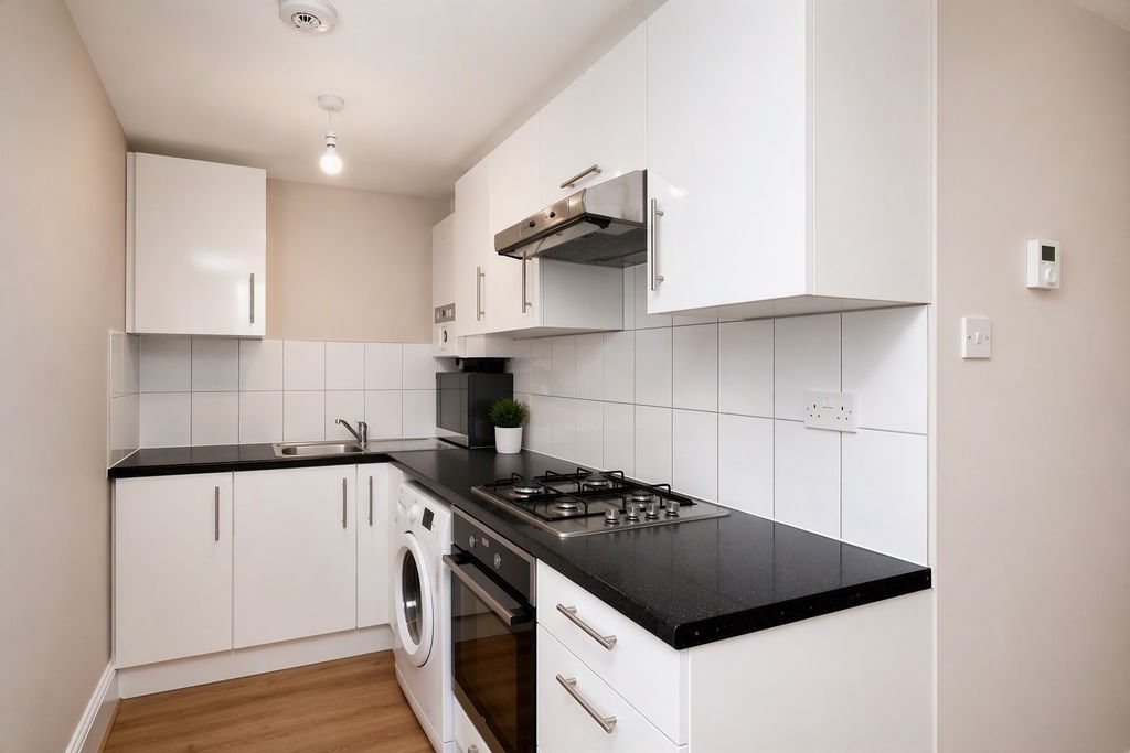 Property photo 2 of 8 Kitchen