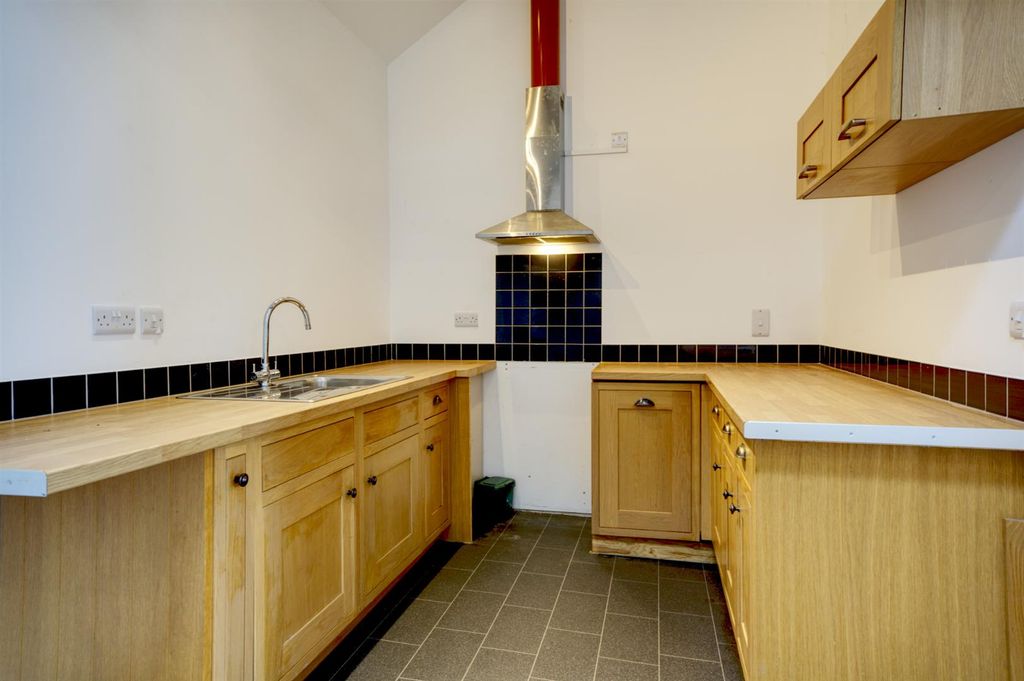 Property photo 1 of 18 Kitchen Area