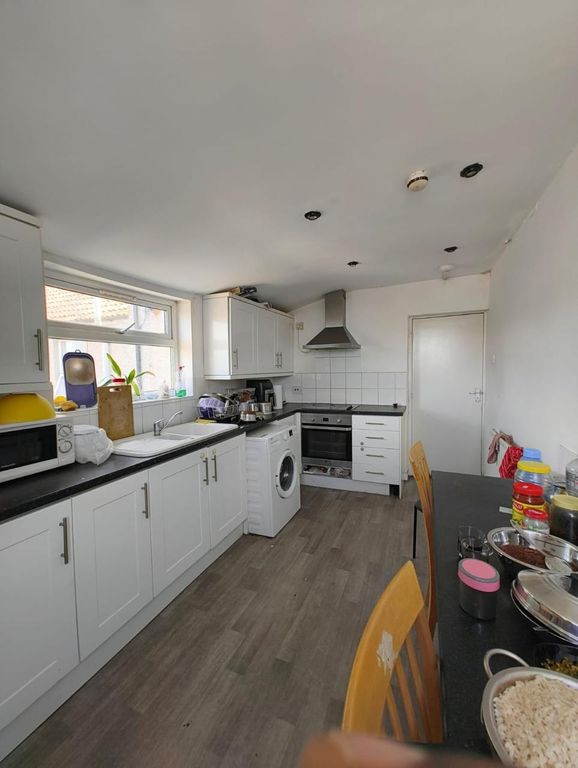 Property photo 1 of 13 Bright And Functional Kitchen Featuring Ample Coun...