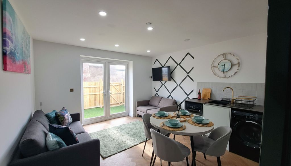 Property photo 1 of 6 Kitchen / Dining / Living