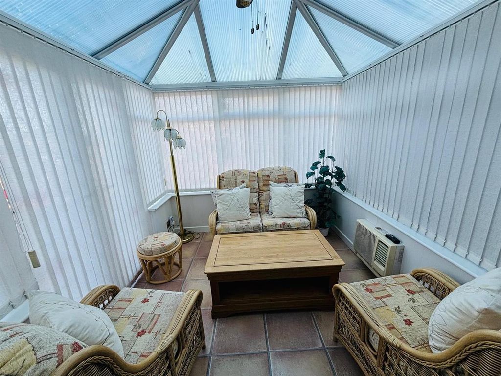 Property photo 3 of 24 Conservatory: