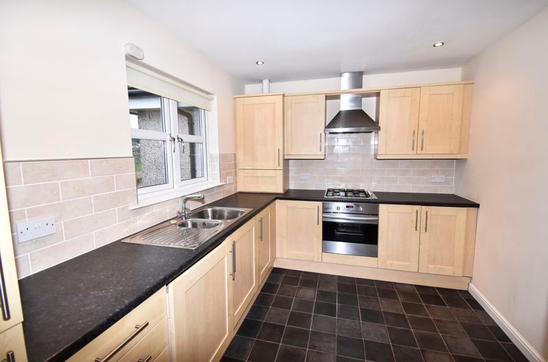 Property photo 3 of 8 Kitchen