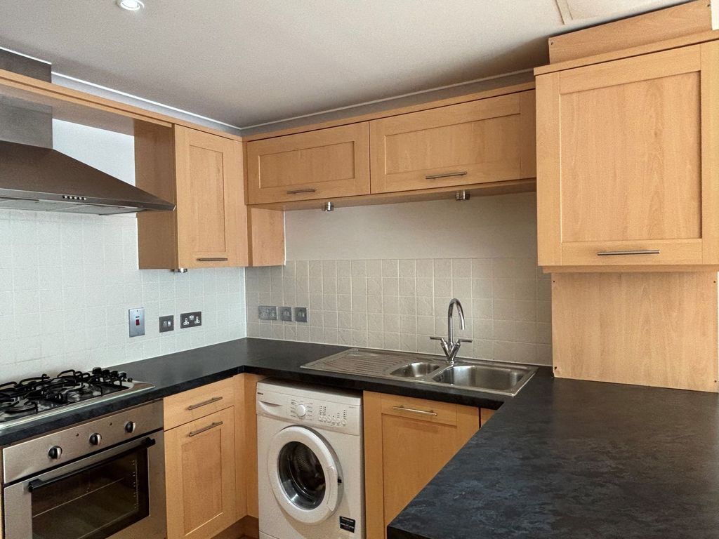 Property photo 3 of 8 Kitchen