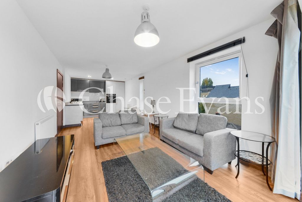 Property photo 3 of 13 Living Area
