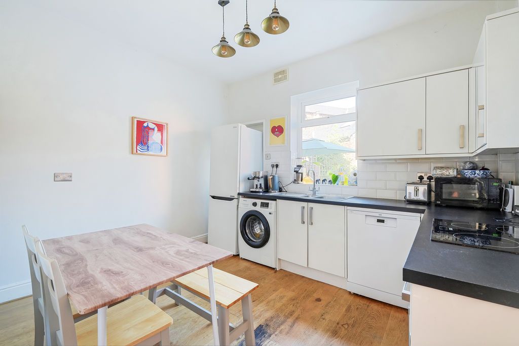 Property photo 3 of 26 Dining Kitchen