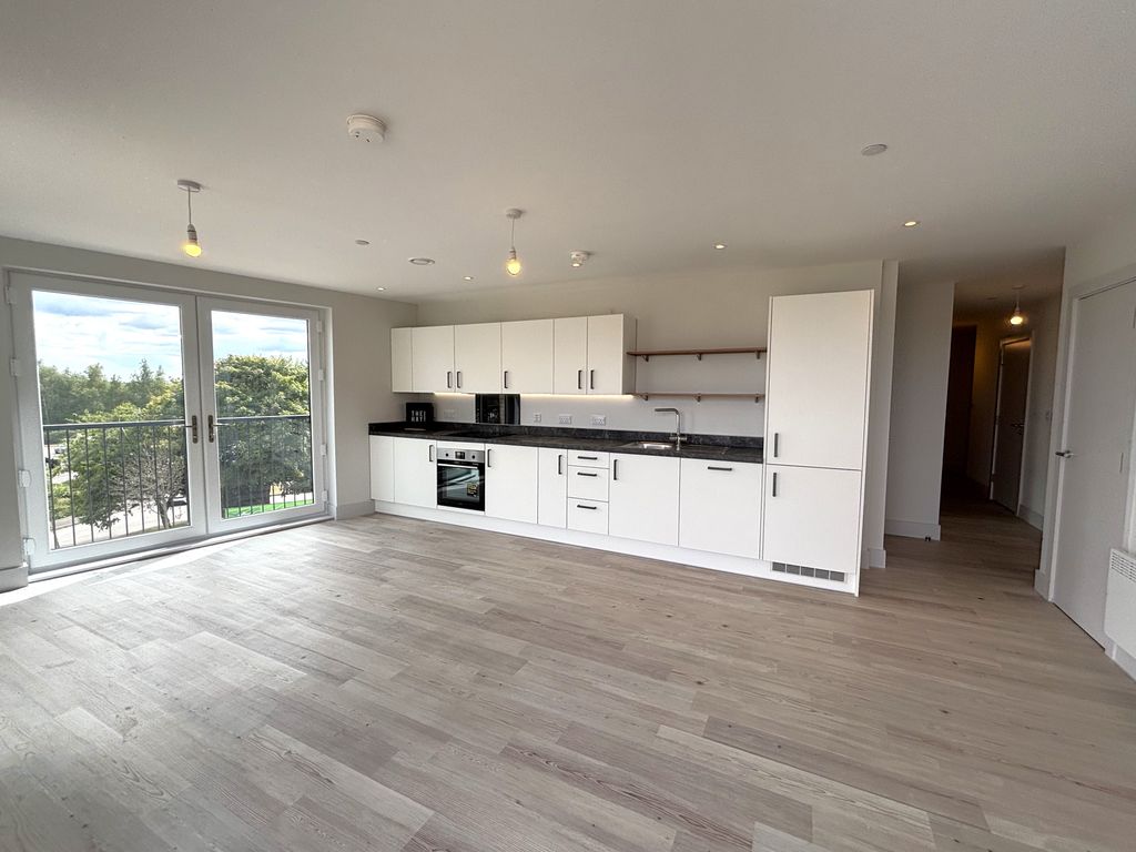 Property photo 3 of 8 Kitchen