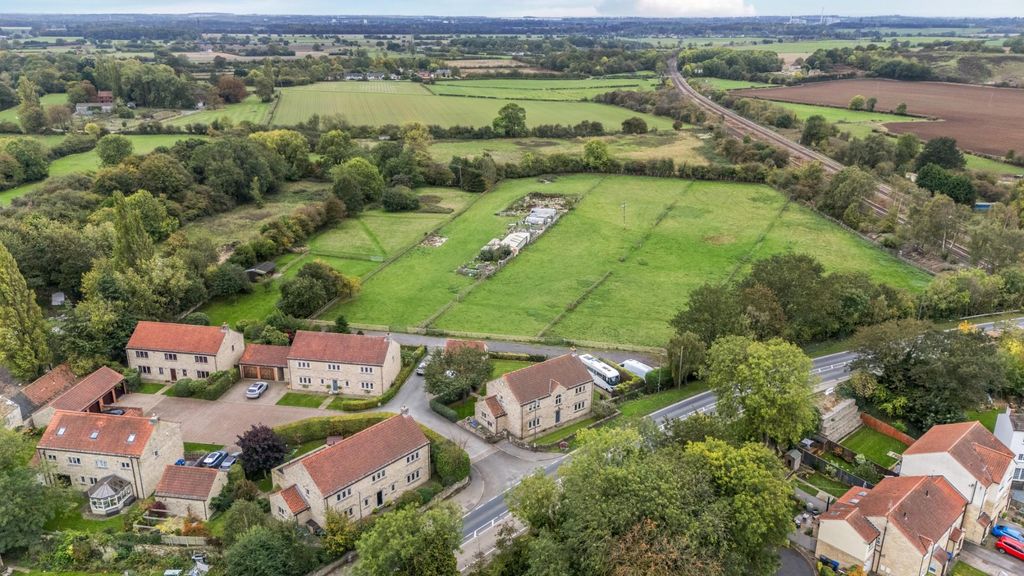 Property photo 2 of 24 Birds Eye Of Village (2).Jpg