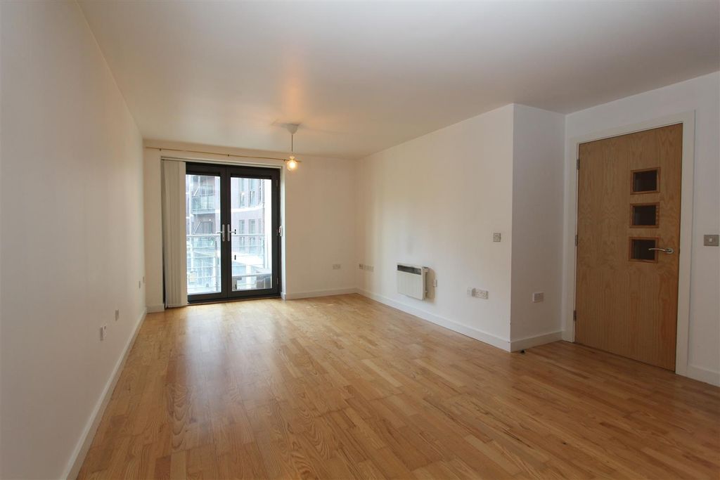 Property photo 2 of 8 Bright Lounge With Sleek Wooden Flooring...