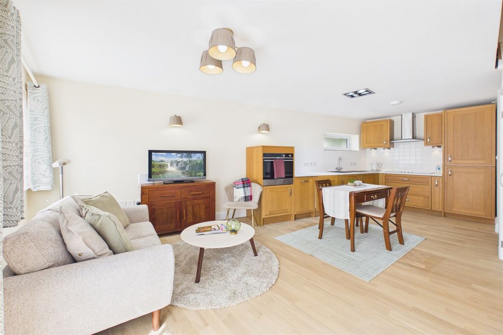 Property photo 1 of 12 Living Room / Kitchen