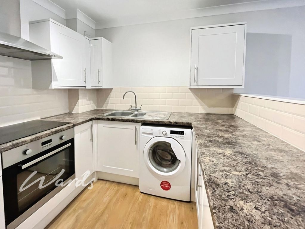 Property photo 2 of 12 Kitchen