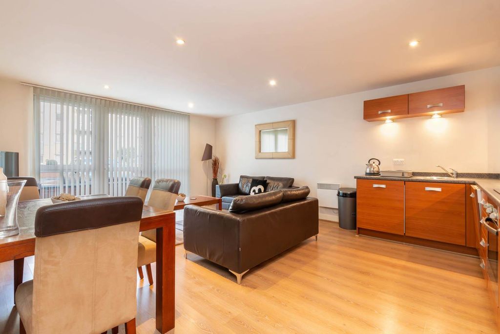 Property photo 3 of 9 Living Area